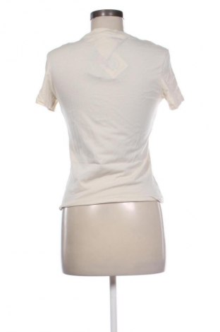 Γυναικείο t-shirt Tommy Jeans, Μέγεθος M, Χρώμα  Μπέζ, Τιμή 36,99 €