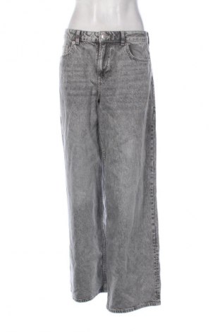 Damskie jeansy H&M Divided, Rozmiar M, Kolor Szary, Cena 66,65 zł
