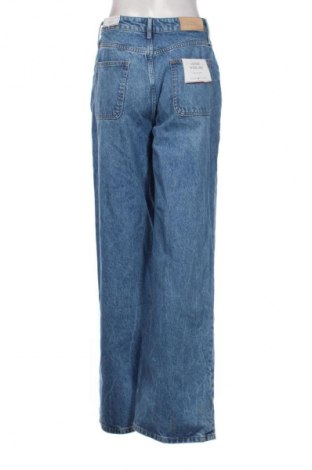 Damskie jeansy Tommy Hilfiger, Rozmiar S, Kolor Niebieski, Cena 504,99 zł