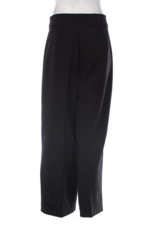 Damskie spodnie Caramel, Rozmiar L, Kolor Czarny, Cena 142,39 zł