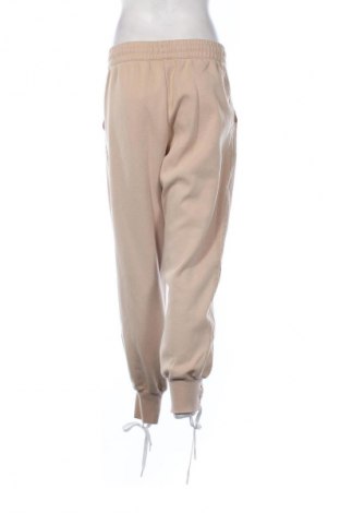 Дамско спортно долнище Adidas Originals, Размер L, Цвят Бежов, Цена 41,00 лв.