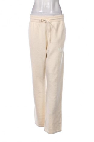 Дамско спортно долнище Adidas Originals, Размер M, Цвят Екрю, Цена 93,99 лв.