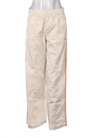 Damskie spodnie sportowe Adidas Originals, Rozmiar M, Kolor Beżowy, Cena 250,99 zł
