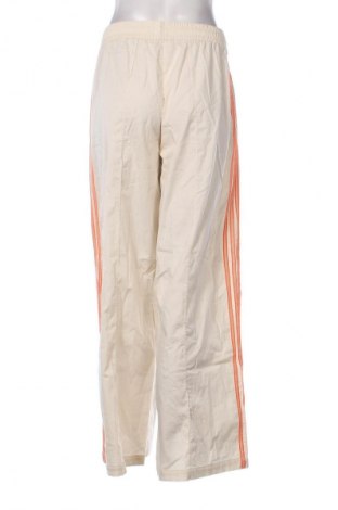 Damskie spodnie sportowe Adidas Originals, Rozmiar M, Kolor Beżowy, Cena 250,99 zł