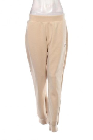 Női sport nadrág Guess, Méret L, Szín Bézs, Ár 35 839 Ft