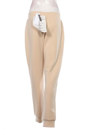 Női sport nadrág Guess, Méret L, Szín Bézs, Ár 35 839 Ft
