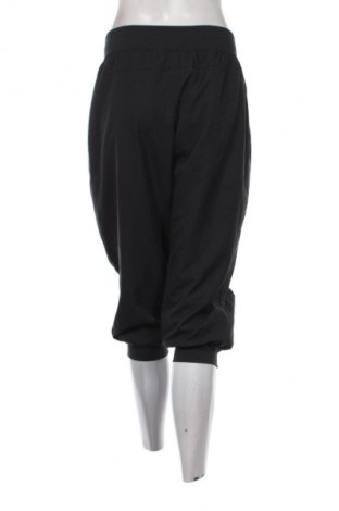 Дамско спортно долнище Nike, Размер XL, Цвят Черен, Цена 47,99 лв.