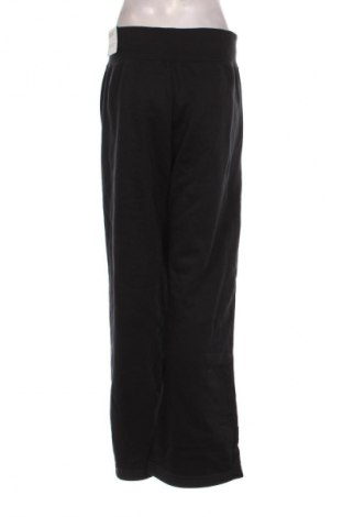 Γυναικείο αθλητικό παντελόνι Nike, Μέγεθος M, Χρώμα Μαύρο, Τιμή 56,99 €