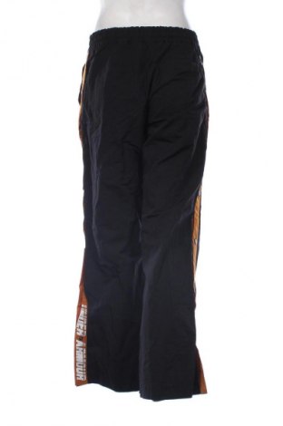 Γυναικείο αθλητικό παντελόνι Under Armour, Μέγεθος M, Χρώμα Πολύχρωμο, Τιμή 21,00 €