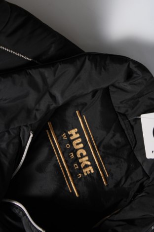 Γυναικείο μπουφάν Hucke, Μέγεθος M, Χρώμα Μαύρο, Τιμή 4,55 €