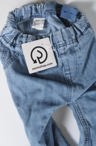 Dziecięce jeansy H&M, Rozmiar 6-9m/ 68-74 cm, Kolor Niebieski, Cena 50,57 zł