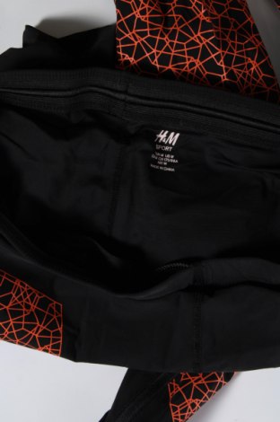 Damskie legginsy H&M Sport, Rozmiar M, Kolor Czarny, Cena 38,99 zł