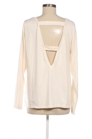 Bluzka damska Crivit, Rozmiar XL, Kolor Beżowy, Cena 53,29 zł