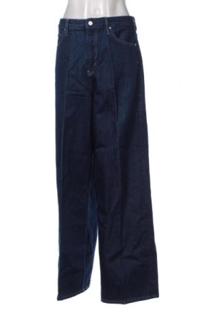 Damskie jeansy Calvin Klein, Rozmiar L, Kolor Niebieski, Cena 413,99 zł