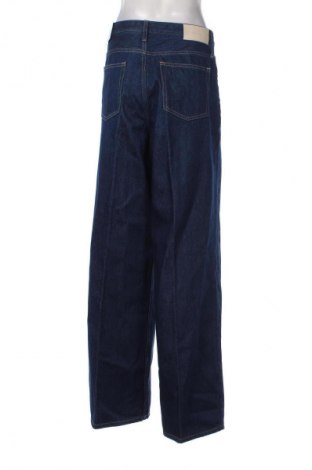 Damskie jeansy Calvin Klein, Rozmiar L, Kolor Niebieski, Cena 413,99 zł