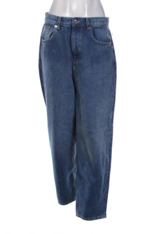 Damskie jeansy Clockhouse, Rozmiar L, Kolor Niebieski, Cena 66,39 zł