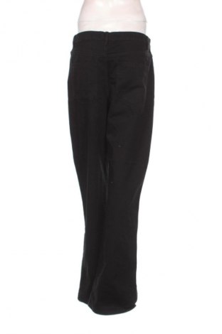 Damskie jeansy Sinsay, Rozmiar M, Kolor Czarny, Cena 68,97 zł