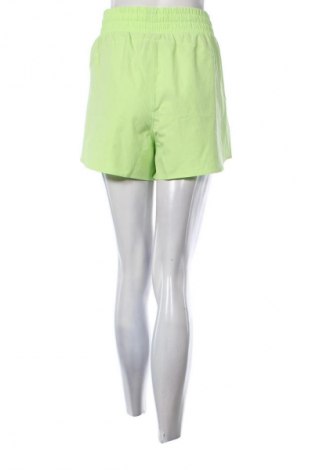 Γυναικείο κοντό παντελόνι Under Armour, Μέγεθος XL, Χρώμα Πράσινο, Τιμή 35,99 €