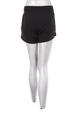 Γυναικείο κοντό παντελόνι Under Armour, Μέγεθος S, Χρώμα Μαύρο, Τιμή 35,99 €