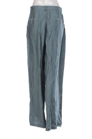 Damenhose Guido Maria Kretschmer for About You, Größe M, Farbe Grau, Preis 44,99 €