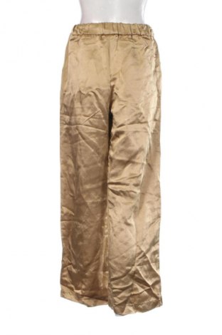 Damskie spodnie Indigo, Rozmiar M, Kolor Beżowy, Cena 43,99 zł