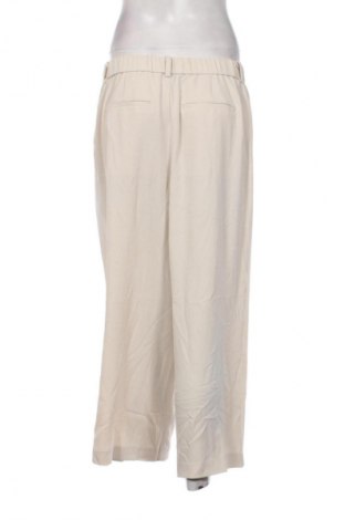 Női nadrág Uniqlo, Méret M, Szín Bézs, Ár 6 329 Ft