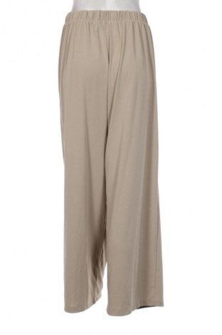 Дамски панталон Uniqlo, Размер L, Цвят Бежов, Цена 24,99 лв.