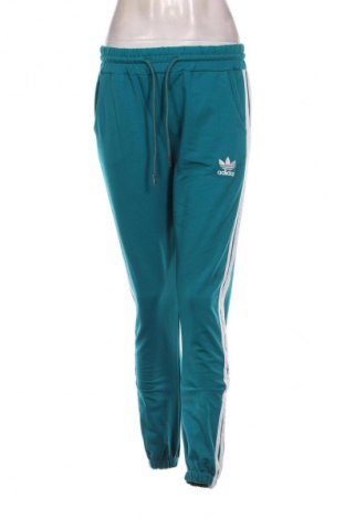 Damskie spodnie sportowe Adidas Originals, Rozmiar M, Kolor Zielony, Cena 131,99 zł