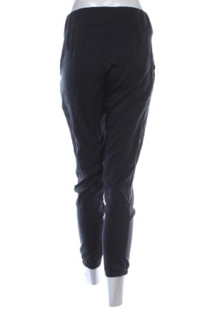 Damskie spodnie sportowe Decathlon, Rozmiar M, Kolor Czarny, Cena 61,99 zł