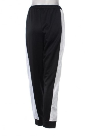 Dámske tepláky Nike, Veľkosť L, Farba Viacfarebná, Cena  24,95 €