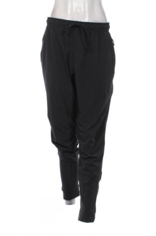 Γυναικείο αθλητικό παντελόνι Nike, Μέγεθος M, Χρώμα Μαύρο, Τιμή 56,99 €