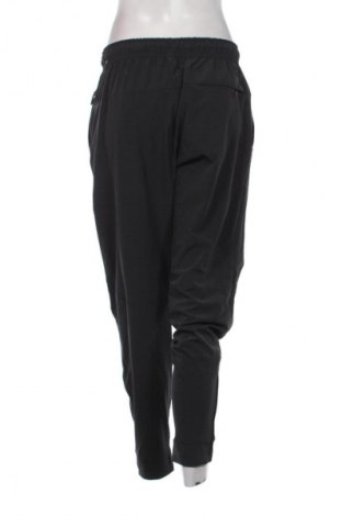 Γυναικείο αθλητικό παντελόνι Nike, Μέγεθος M, Χρώμα Μαύρο, Τιμή 56,99 €