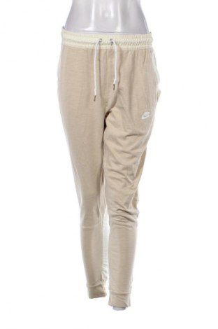 Damskie spodnie sportowe Nike, Rozmiar S, Kolor Beżowy, Cena 154,99 zł