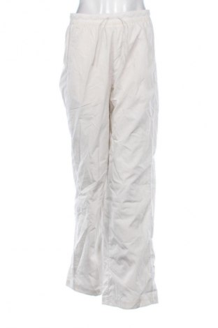 Dámske tepláky Nike, Veľkosť S, Farba Béžová, Cena  45,95 €