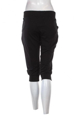 Damen Sporthose PUMA, Größe L, Farbe Schwarz, Preis 34,28 €