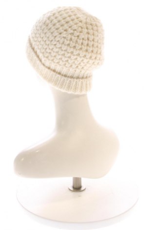 Детска шапка Uniqlo, Цвят Екрю, Цена 13,99 лв.