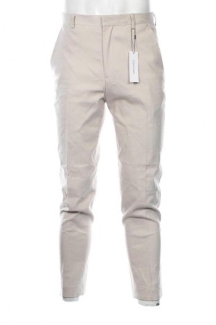 Pantaloni de bărbați Calvin Klein, Mărime M, Culoare Ecru, Preț 634,99 Lei