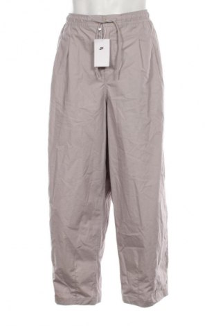 Herrenhose Nike, Größe L, Farbe Beige, Preis 66,99 €