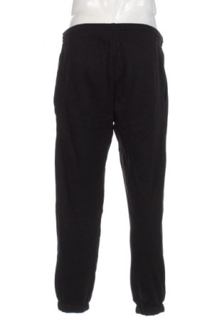 Мъжко поларено долнище Lacoste, Размер M, Цвят Черен, Цена 68,99 лв.