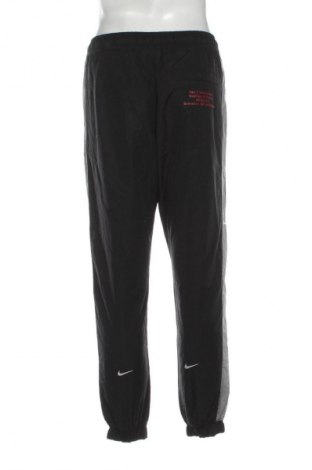 Pánské tepláky  Nike, Velikost S, Barva Vícebarevné, Cena  899,00 Kč