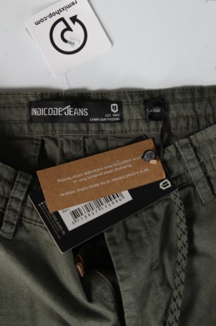 Męskie spodnie Indicode, Rozmiar M, Kolor Zielony, 55% elastyna, 45% bawełna, Cena 62,70 zł