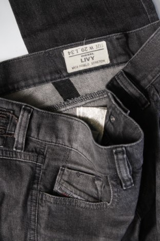 Damskie jeansy Diesel, Rozmiar L, Kolor Szary, Cena 155,99 zł