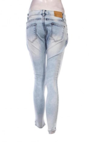 Damskie jeansy Zara Trafaluc, Rozmiar M, Kolor Niebieski, Cena 40,99 zł