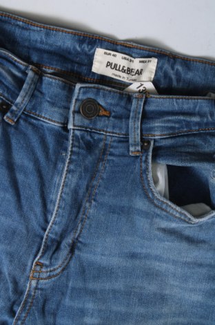 Męskie jeansy Pull&Bear, Rozmiar M, Kolor Niebieski, Cena 58,99 zł