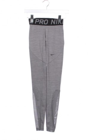 Damskie legginsy Nike, Rozmiar XS, Kolor Szary, Cena 77,75 zł