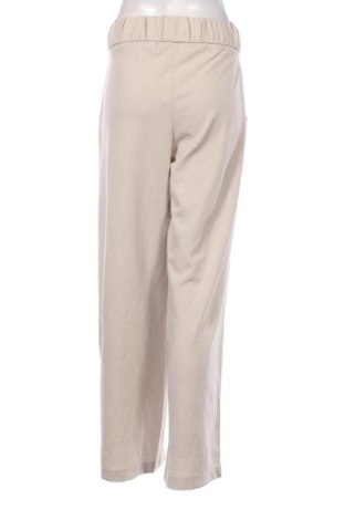 Damskie spodnie Jdy, Rozmiar L, Kolor Beżowy, Cena 39,99 zł