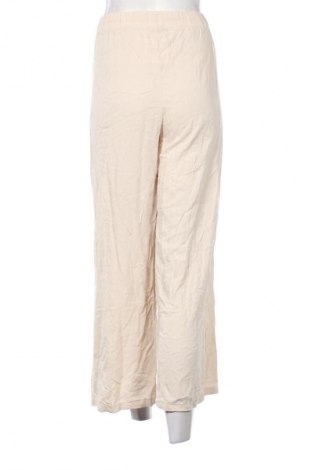Damskie spodnie Oyanda, Rozmiar XL, Kolor ecru, Cena 66,39 zł