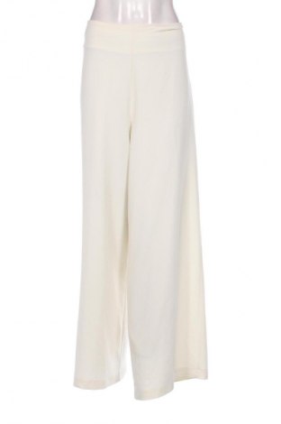 Damskie spodnie Unbranded, Rozmiar M, Kolor ecru, Cena 91,95 zł