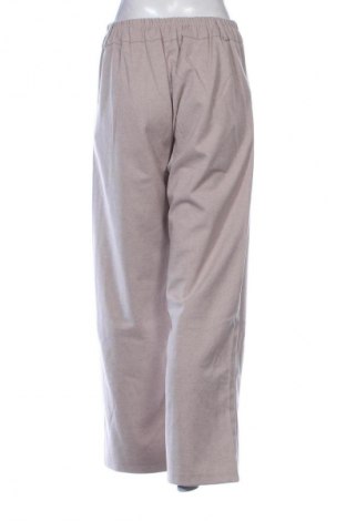 Damskie spodnie Unbranded, Rozmiar M, Kolor Beżowy, Cena 67,41 zł