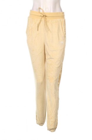 Γυναικείο αθλητικό παντελόνι Adidas, Μέγεθος S, Χρώμα Κίτρινο, Τιμή 34,99 €